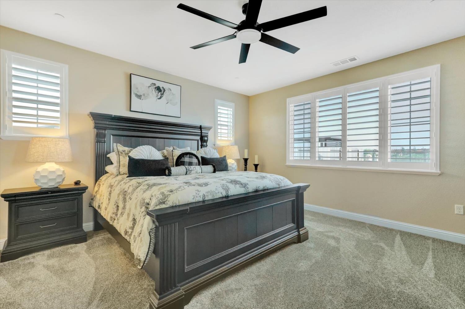 1104 Shadowgate Drive Roseville, CA 95747 - Photo 22 of 41 a bedroom with a bed and a window