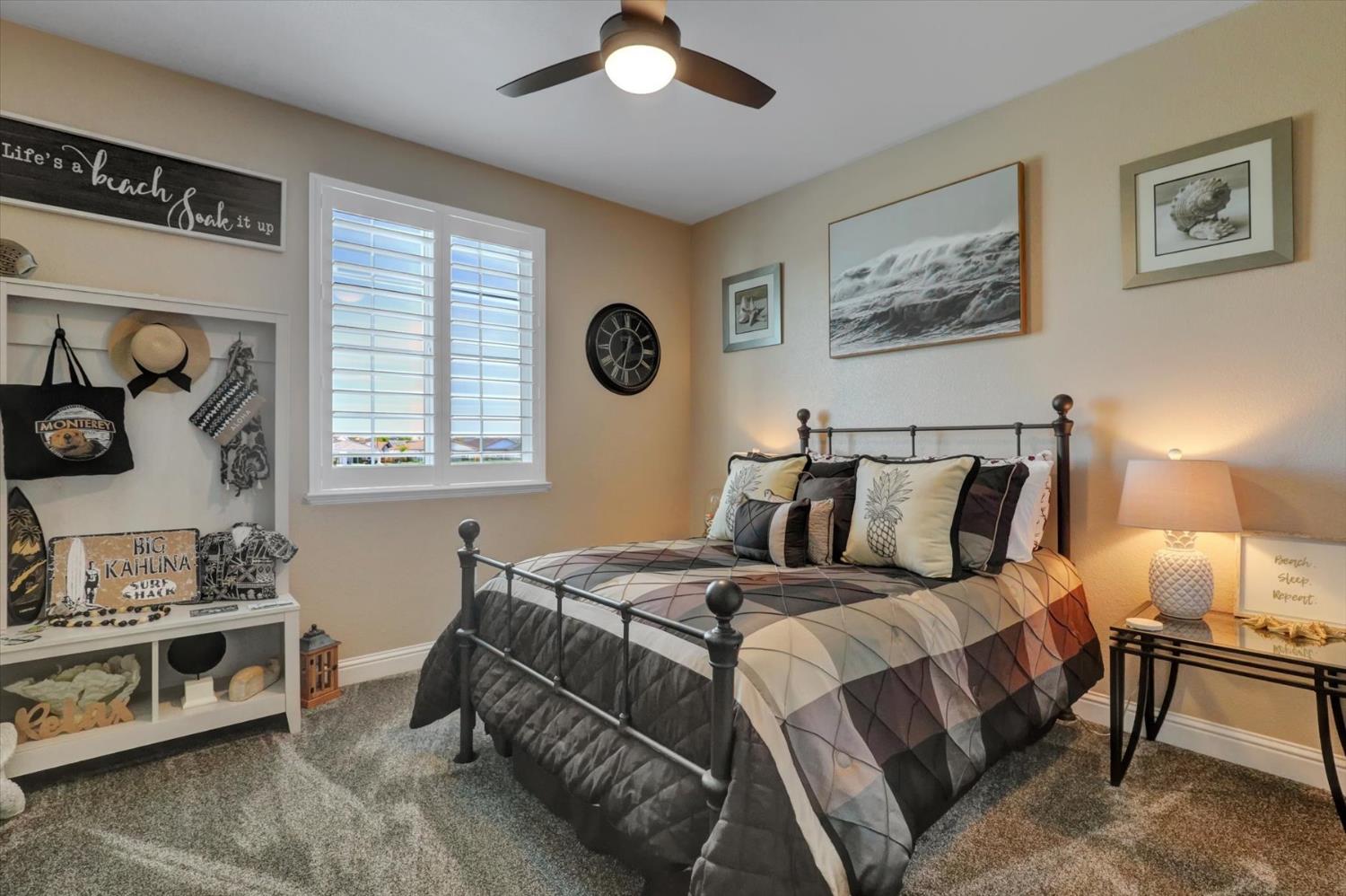 1104 Shadowgate Drive Roseville, CA 95747 - Photo 32 of 41 a bedroom with a bed and a window