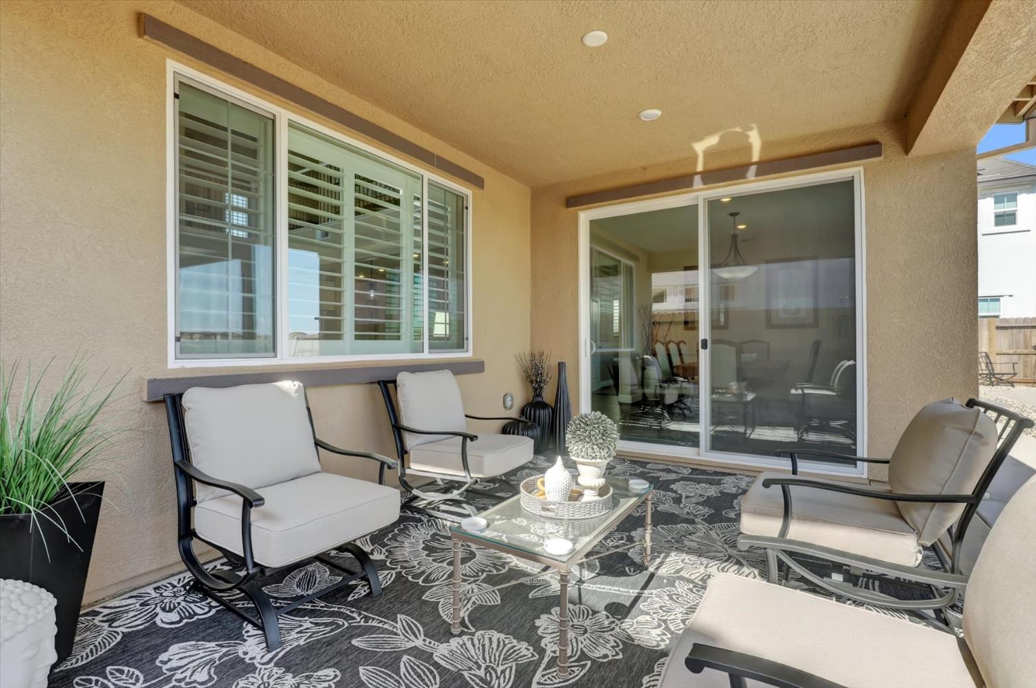 1104 Shadowgate Drive Roseville, CA 95747 - Photo 35 of 41 a outdoor living space with furniture and a window