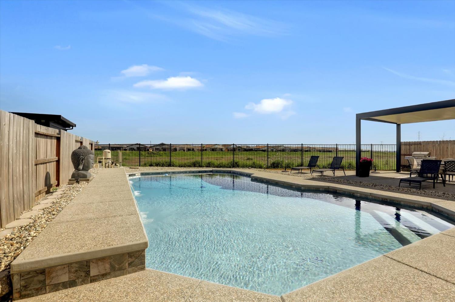 1104 Shadowgate Drive Roseville, CA 95747 - Photo 36 of 41 a view of swimming pool with outdoor seating