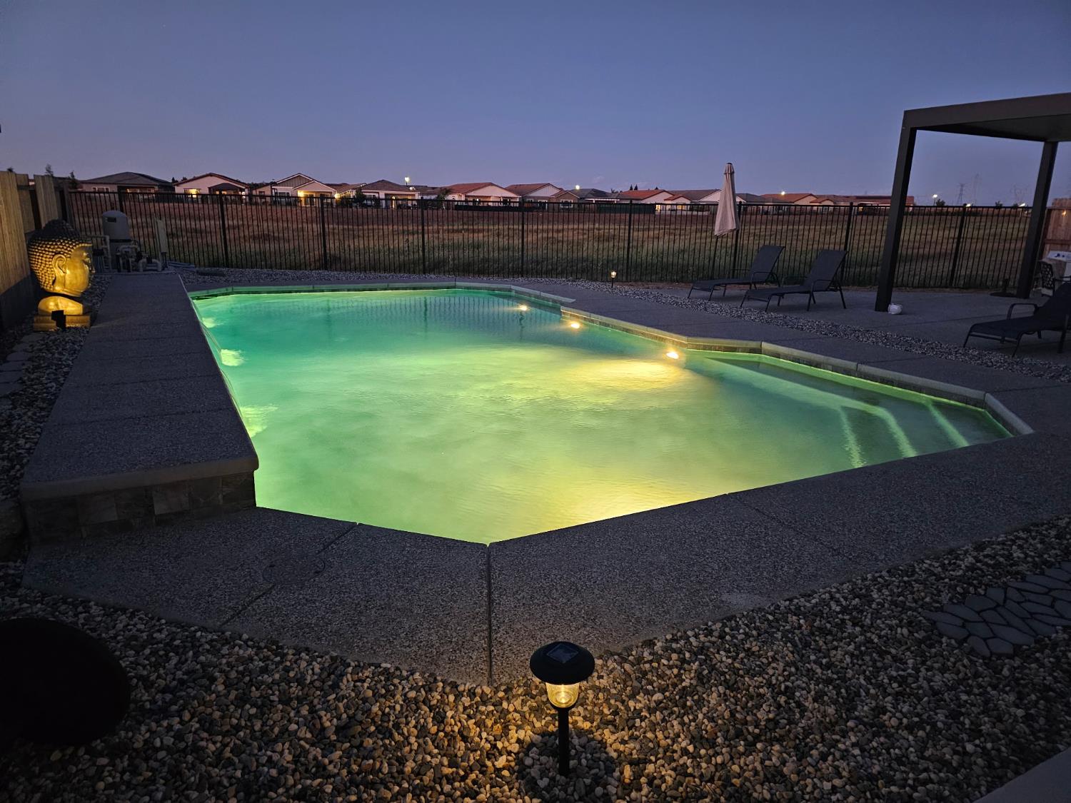 1104 Shadowgate Drive Roseville, CA 95747 - Photo 37 of 41 a view of a swimming pool with a yard