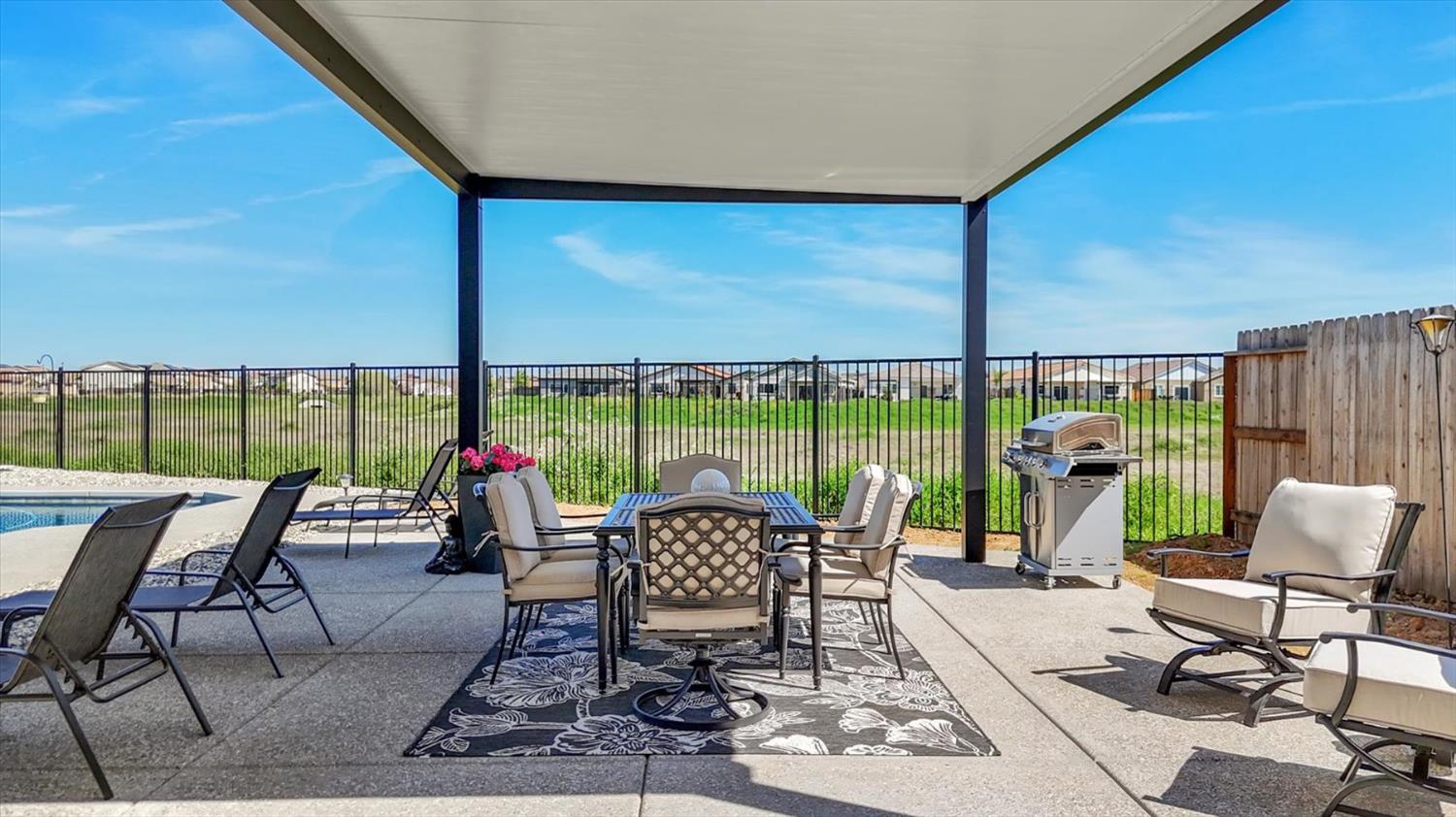 1104 Shadowgate Drive Roseville, CA 95747 - Photo 39 of 41 a living room with furniture and floor to ceiling windows