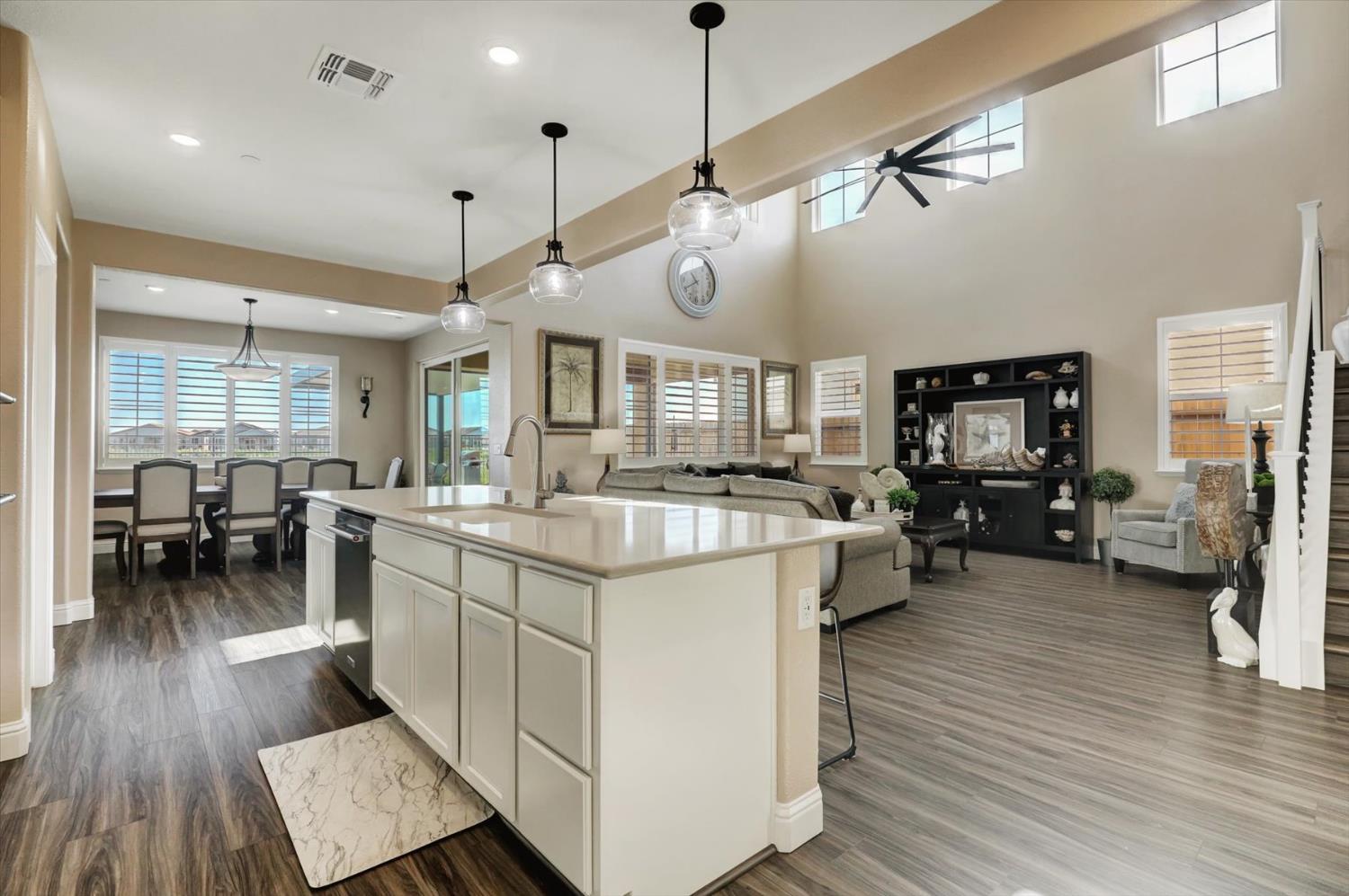 1104 Shadowgate Drive Roseville, CA 95747 - Photo 8 of 41 a large kitchen with lots of counter space a sink appliances and dining table