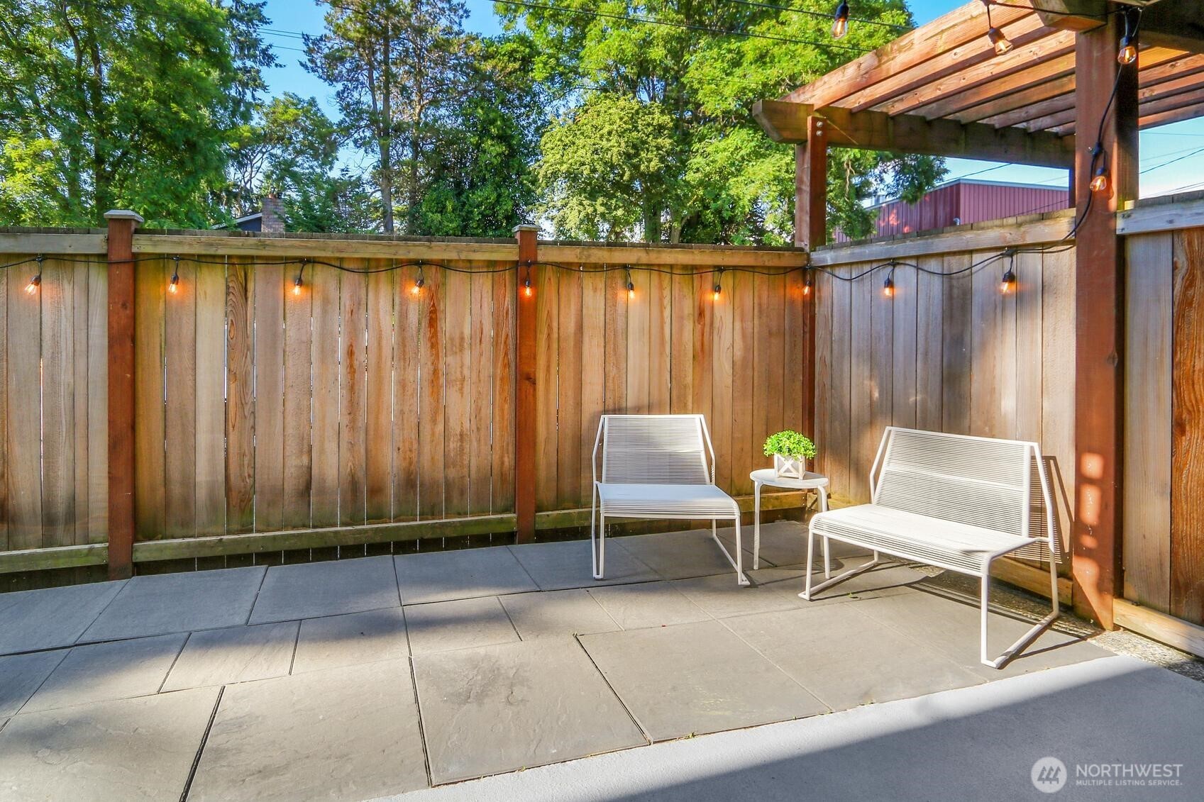 939 North 101st Street, Unit 101 Seattle, WA 98133 - Photo 12 of 13 a view of chair and table in patio