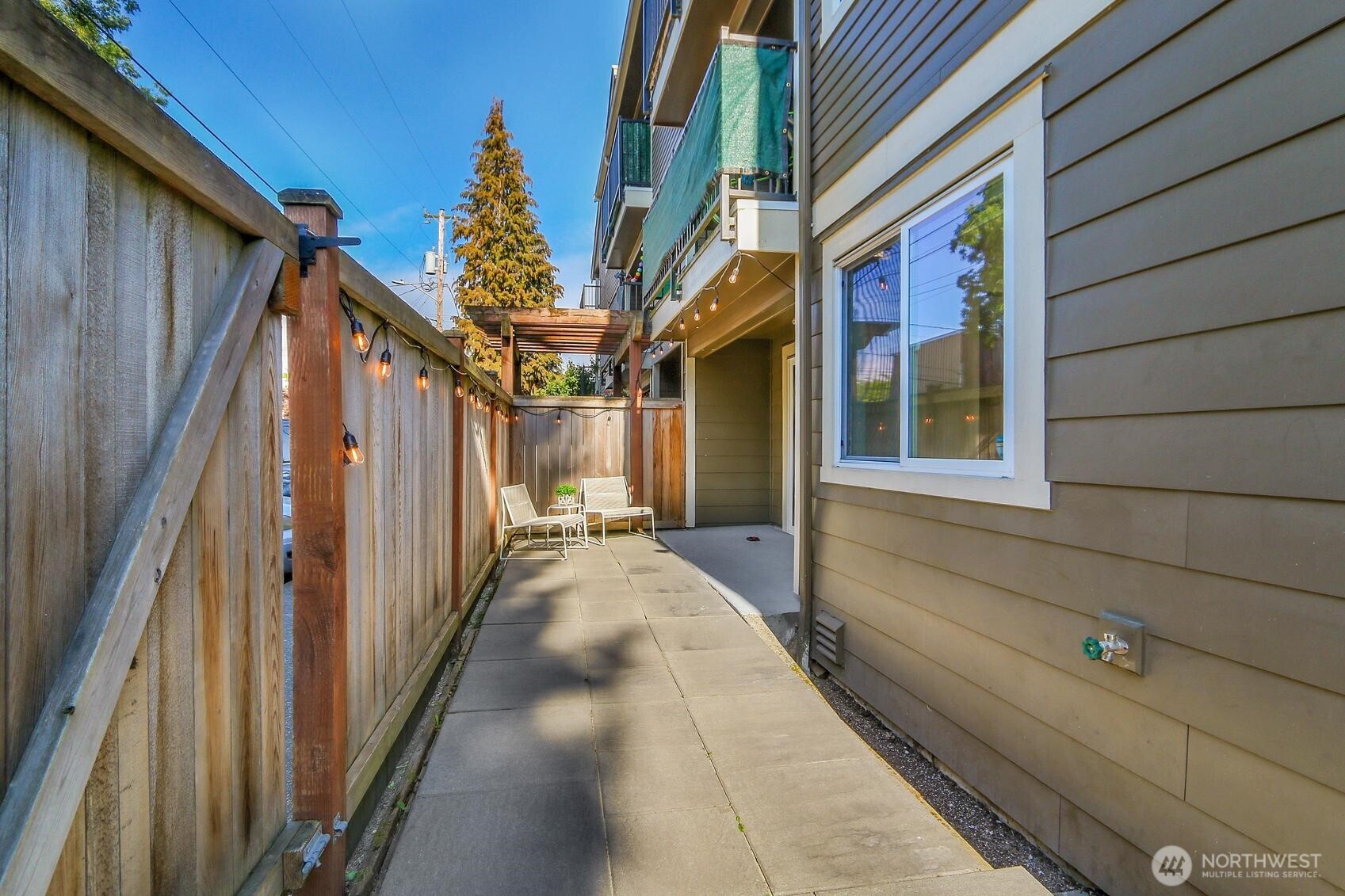 939 North 101st Street, Unit 101 Seattle, WA 98133 - Photo 13 of 13 a view of a house with a staircase