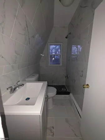 a bathroom with a sink and a bathtub