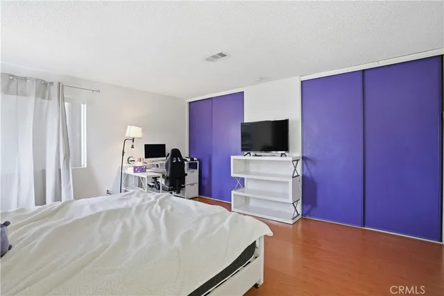 a room with furniture and a flat screen tv