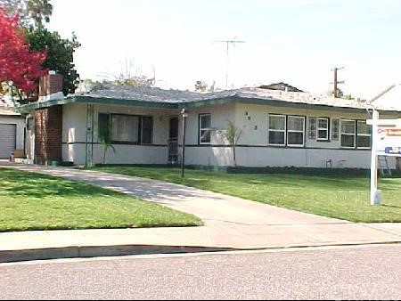 3512 Nelson Street Riverside, CA 92506 - Photo 1 of 1 a view of a house with a garden and plants