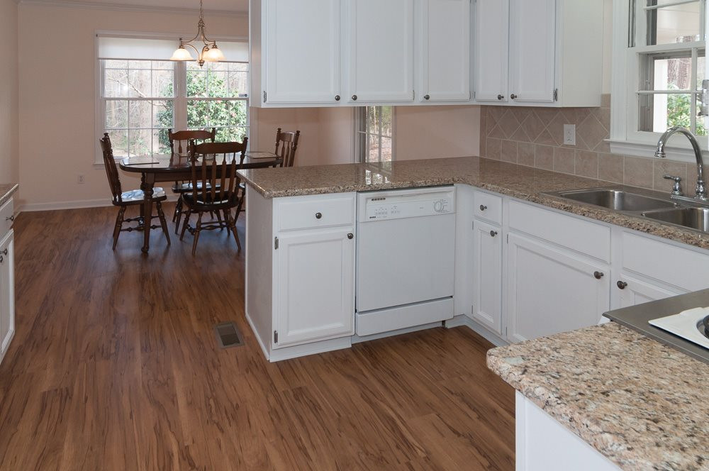 1445 Princess Anne Road Raleigh, NC 27607 - Photo 5 of 25 Large dining area, great light, complement kitchen! Kitchen