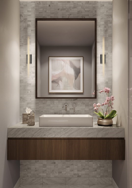 40 Trinity Place, Unit 31E Boston, MA 02116 - Photo 3 of 12 a bathroom with a sink and a mirror