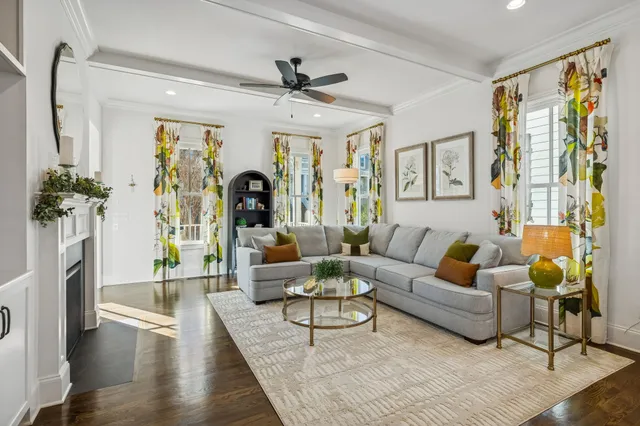 a large kitchen with cabinets table and chairs