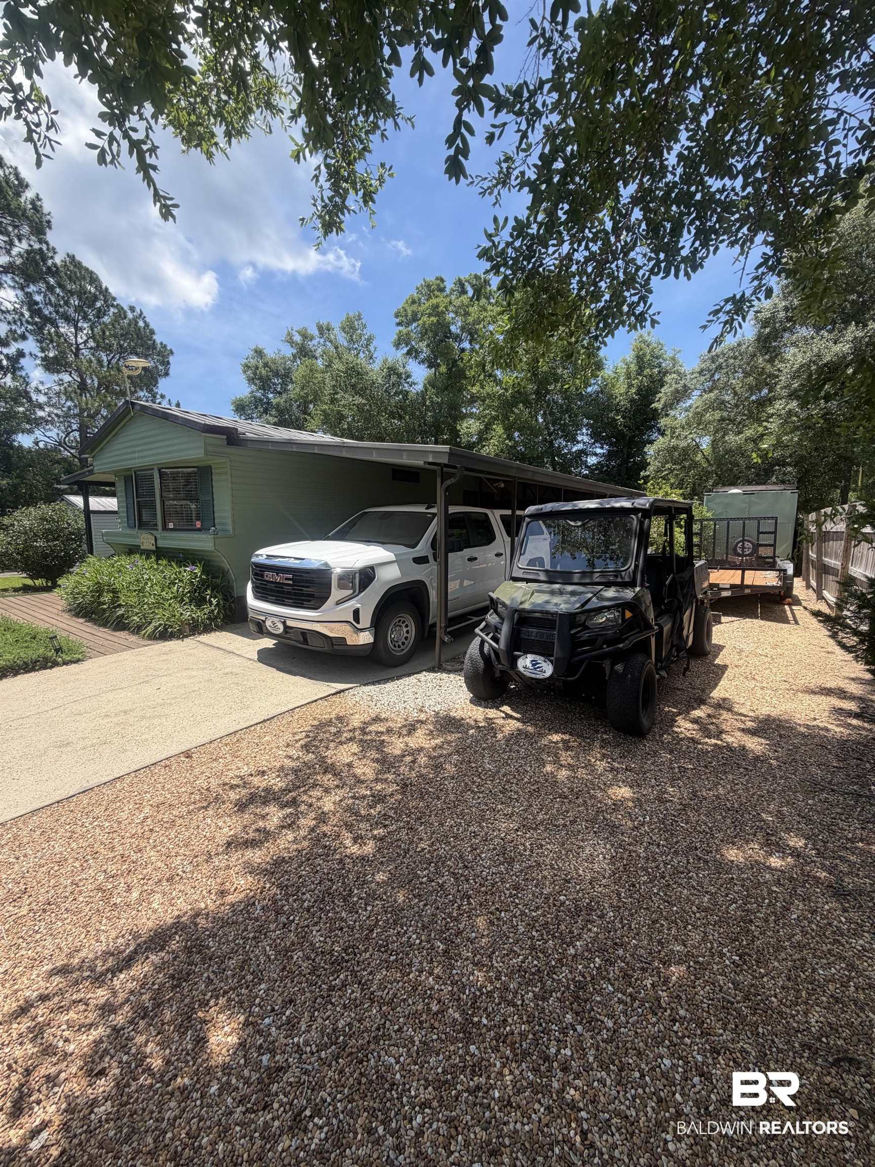 1620 Del Rey Drive Lillian, AL 36549 - Photo 2 of 45 Single-story residence featuring a carport and light green siding