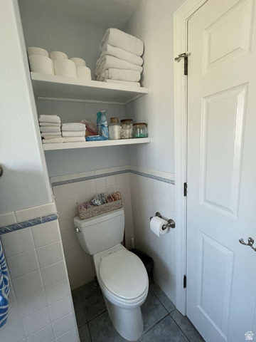 7030 West 2100 North Mendon, UT 84325 - Photo 45 of 67 White tile wainscoting with decorative border accents