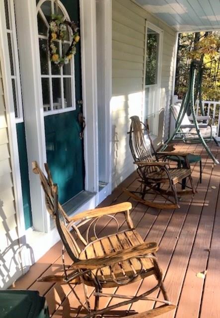 203 Waterville Road South China, ME 04358 - Photo 2 of 33 Enjoy the farmer's porch in the warm...