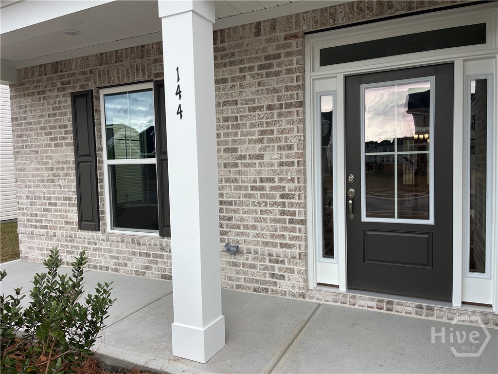 144 Como Drive Pooler, GA 31322 - Photo 4 of 25 Rocking Chair Front Porch