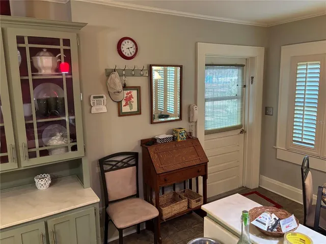 a room with furniture and a window