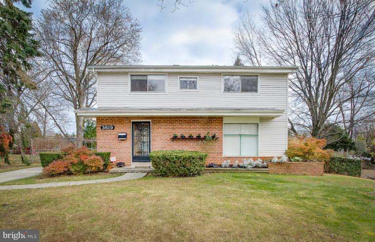 3619 Rusty Rock Road Randallstown, MD 21133 - Photo 1 of 30 a front view of a house with garden