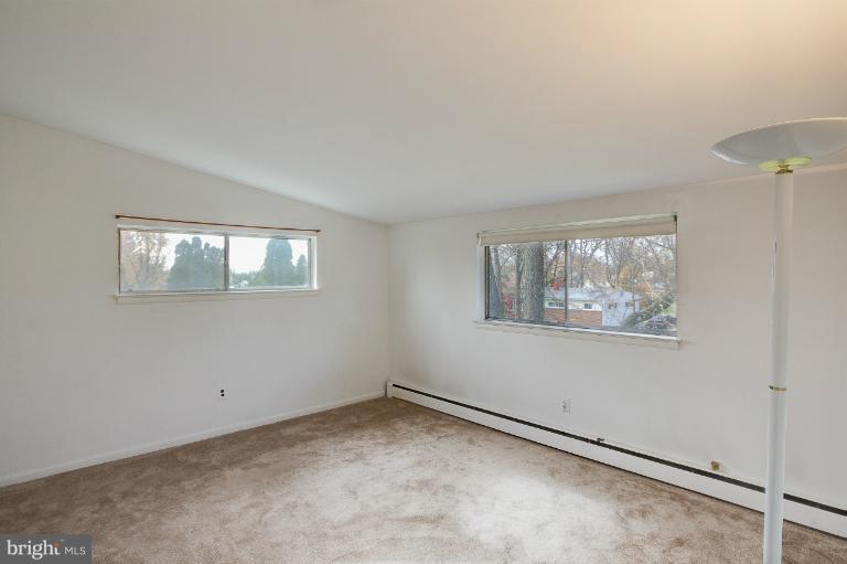 3619 Rusty Rock Road Randallstown, MD 21133 - Photo 14 of 30 a view of an empty room with a window