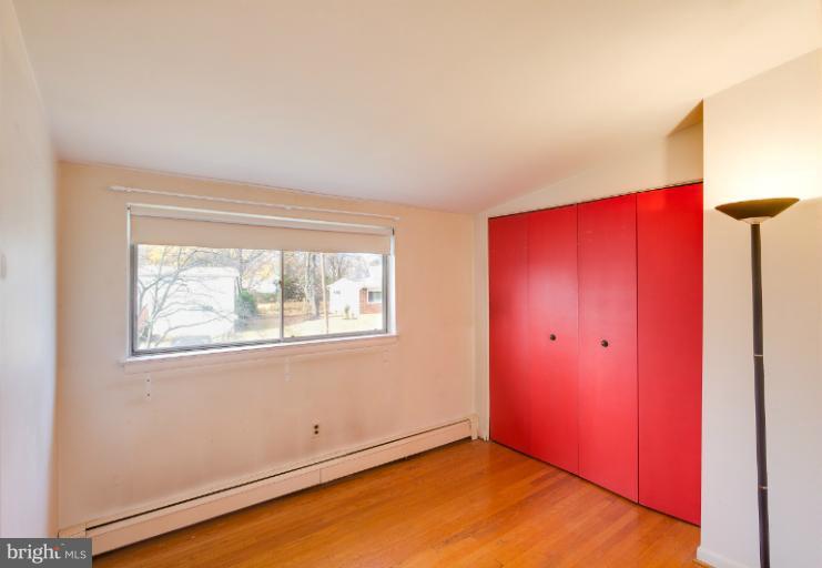 3619 Rusty Rock Road Randallstown, MD 21133 - Photo 22 of 30 an empty room with windows