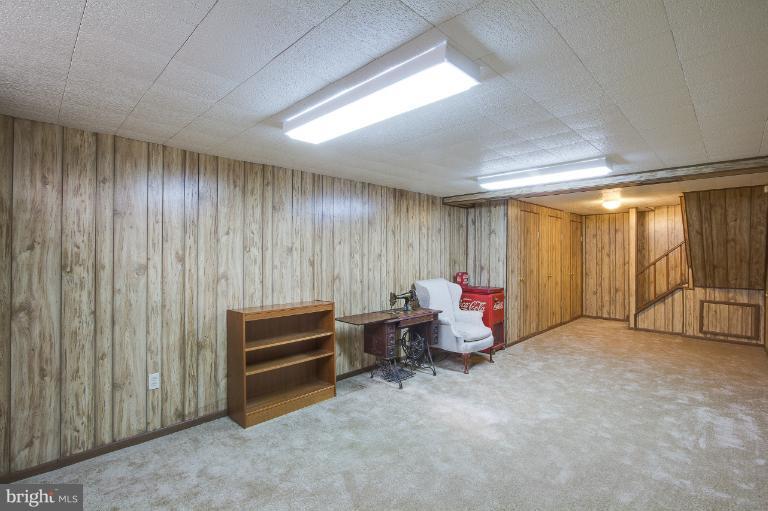 3619 Rusty Rock Road Randallstown, MD 21133 - Photo 25 of 30 a living room with furniture and a window