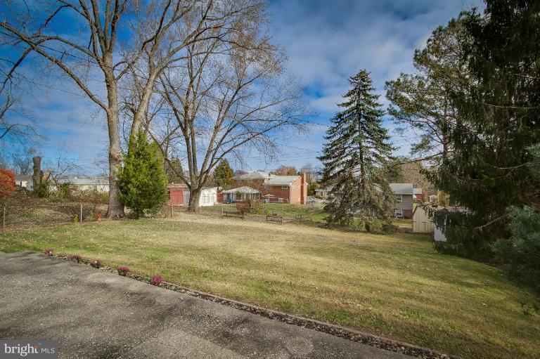 3619 Rusty Rock Road Randallstown, MD 21133 - Photo 28 of 30 a view of a yard with a house