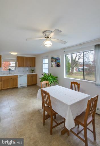 3619 Rusty Rock Road Randallstown, MD 21133 - Photo 9 of 30 a view of a dining room with furniture window and outside view