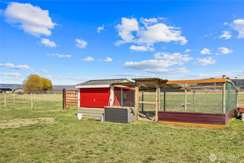 a view of houses with yard