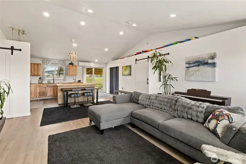 a living room with furniture and a couch