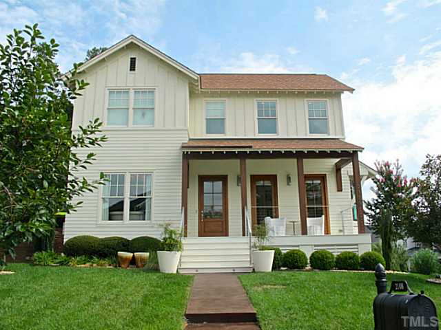 2108 Blue Oak Terrace Raleigh, NC 27608 - Photo 1 of 25 a front view of a house with a yard