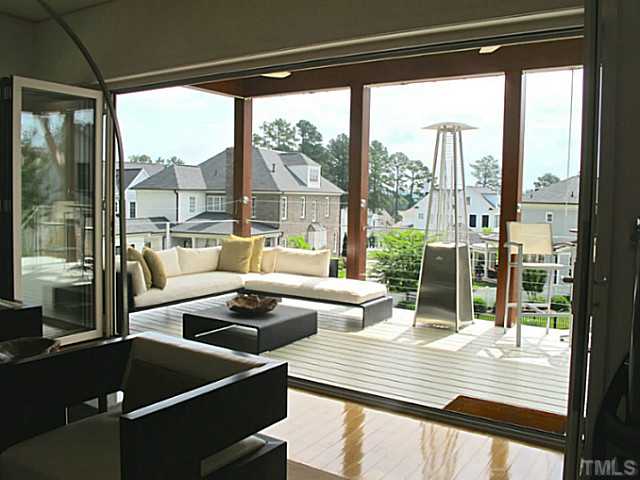 2108 Blue Oak Terrace Raleigh, NC 27608 - Photo 7 of 25 a room with furniture and a large window
