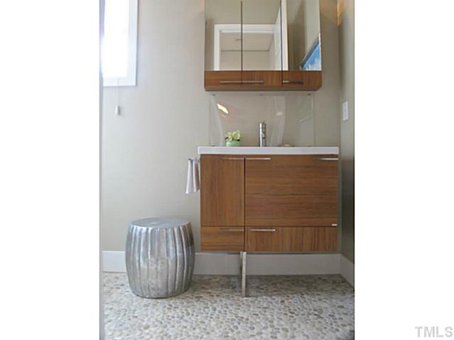 2108 Blue Oak Terrace Raleigh, NC 27608 - Photo 10 of 25 a bathroom with a sink