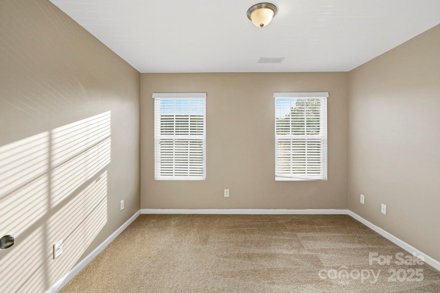 8988 Lanark Lane Fort Mill, SC 29707 - Photo 19 of 43 a view of an empty room with a window