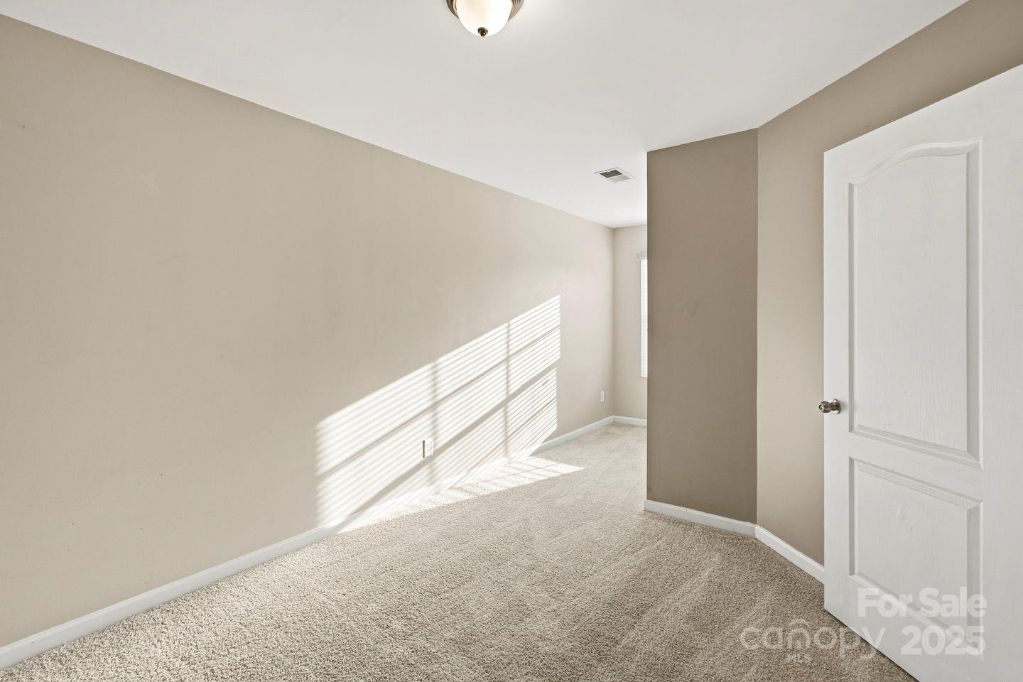 8988 Lanark Lane Fort Mill, SC 29707 - Photo 23 of 43 a view of an empty room