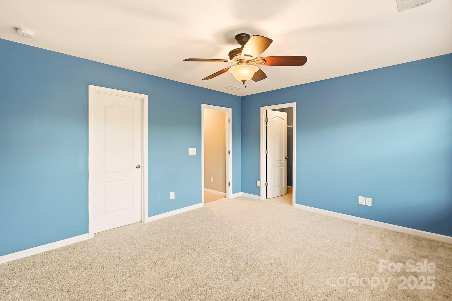 8988 Lanark Lane Fort Mill, SC 29707 - Photo 28 of 43 a view of a room with a ceiling fan and window