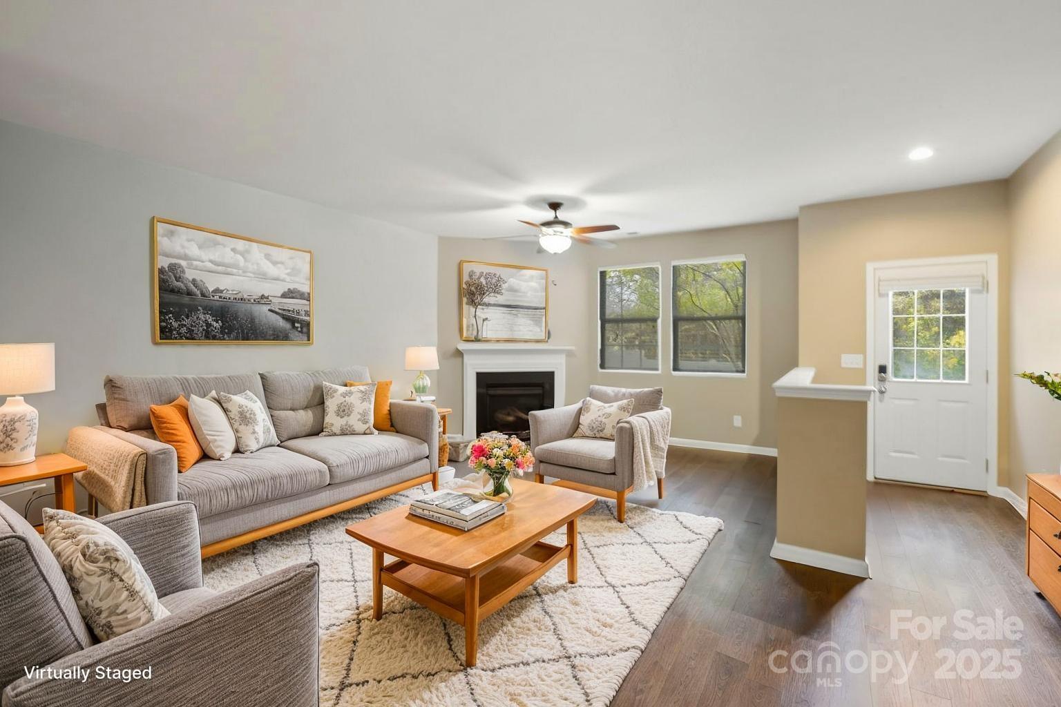 8988 Lanark Lane Fort Mill, SC 29707 - Photo 4 of 43 a living room with furniture and a fireplace