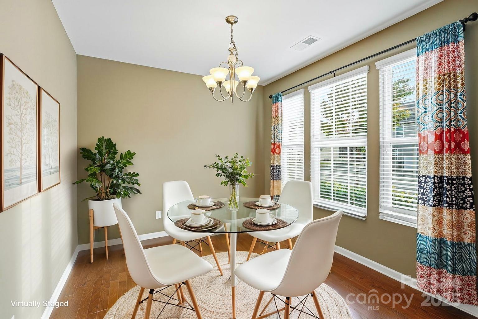 8988 Lanark Lane Fort Mill, SC 29707 - Photo 6 of 43 a dining room with furniture and window