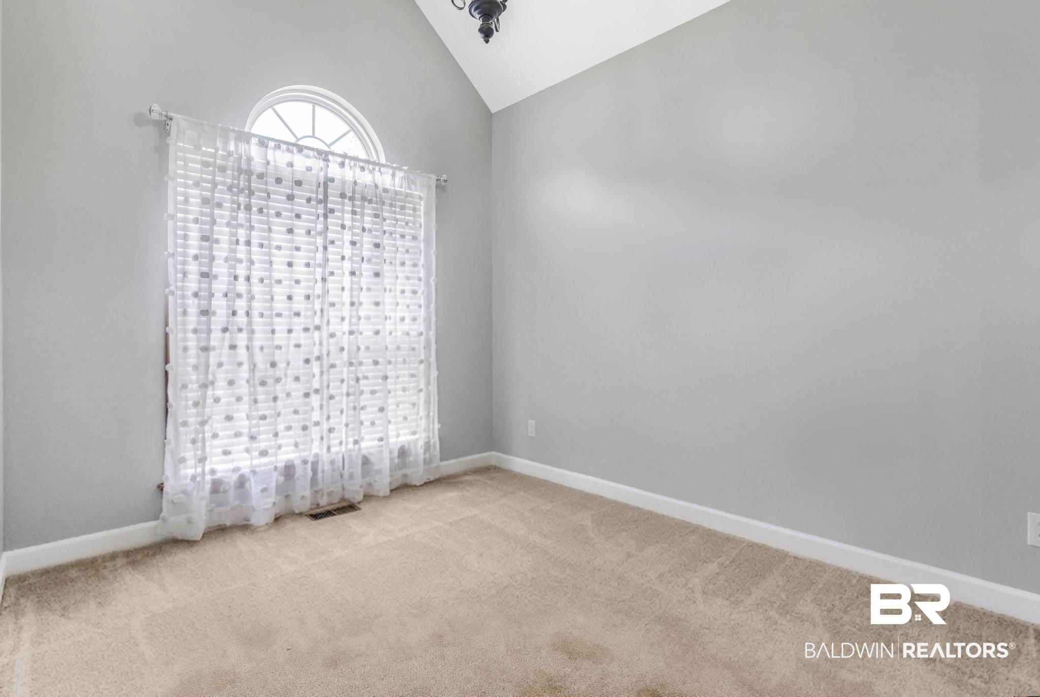 35814 Delvan Lane Bay Minette, AL 36507 - Photo 39 of 53 Carpeted room with vaulted ceilings and light gray walls
