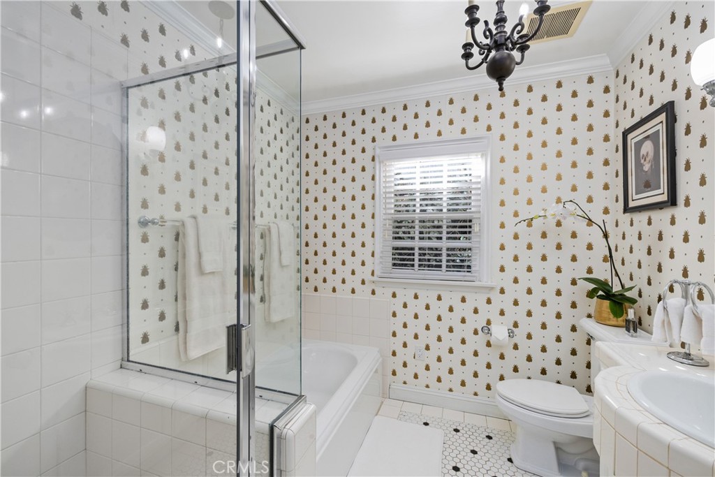 5306 Norwich Avenue Sherman Oaks, CA 91411 - Photo 19 of 43 a bathroom with a sink toilet a shower and a bathtub