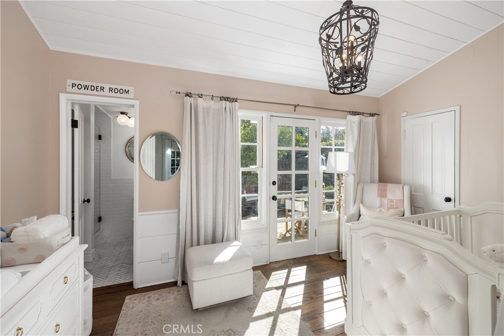 5306 Norwich Avenue Sherman Oaks, CA 91411 - Photo 21 of 43 a living room with furniture and chandelier