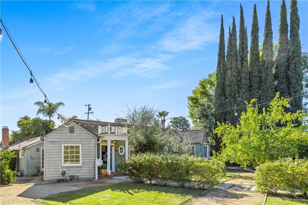 5306 Norwich Avenue Sherman Oaks, CA 91411 - Photo 29 of 43 a front view of a house with a yard