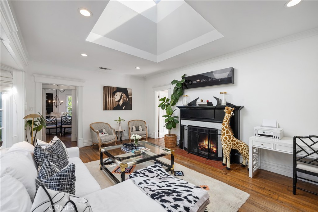 5306 Norwich Avenue Sherman Oaks, CA 91411 - Photo 5 of 43 a living room with furniture and a fireplace