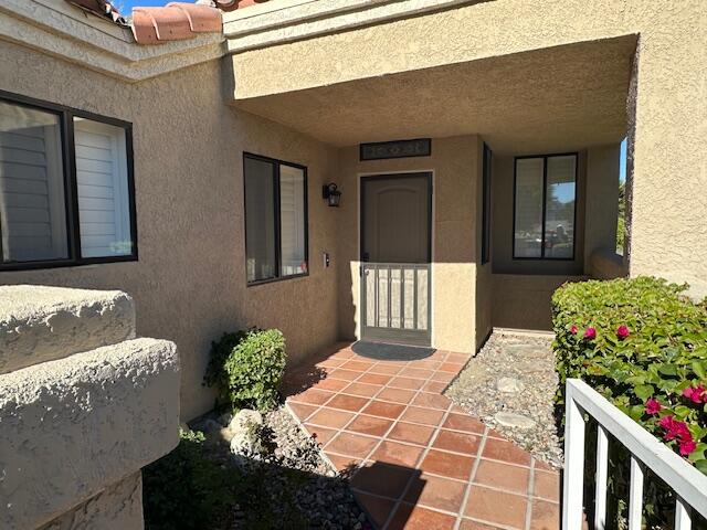 41869 Preston Trail Palm Desert, CA 92211 - Photo 2 of 23 a front view of a house