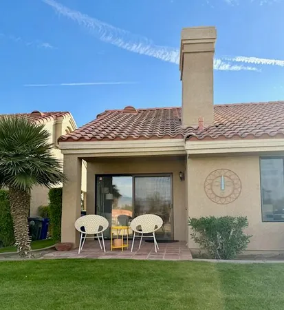 a view of a house with patio