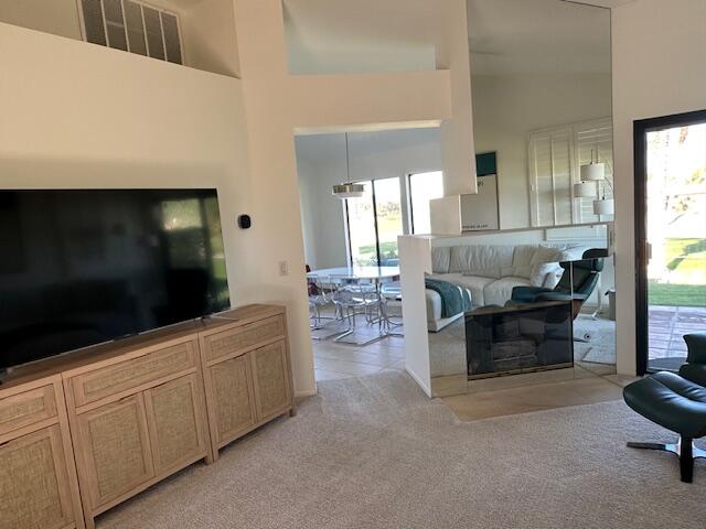 41869 Preston Trail Palm Desert, CA 92211 - Photo 6 of 23 a living room with furniture and a flat screen tv