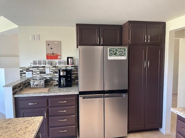 41869 Preston Trail Palm Desert, CA 92211 - Photo 10 of 23 a kitchen with refrigerator and window