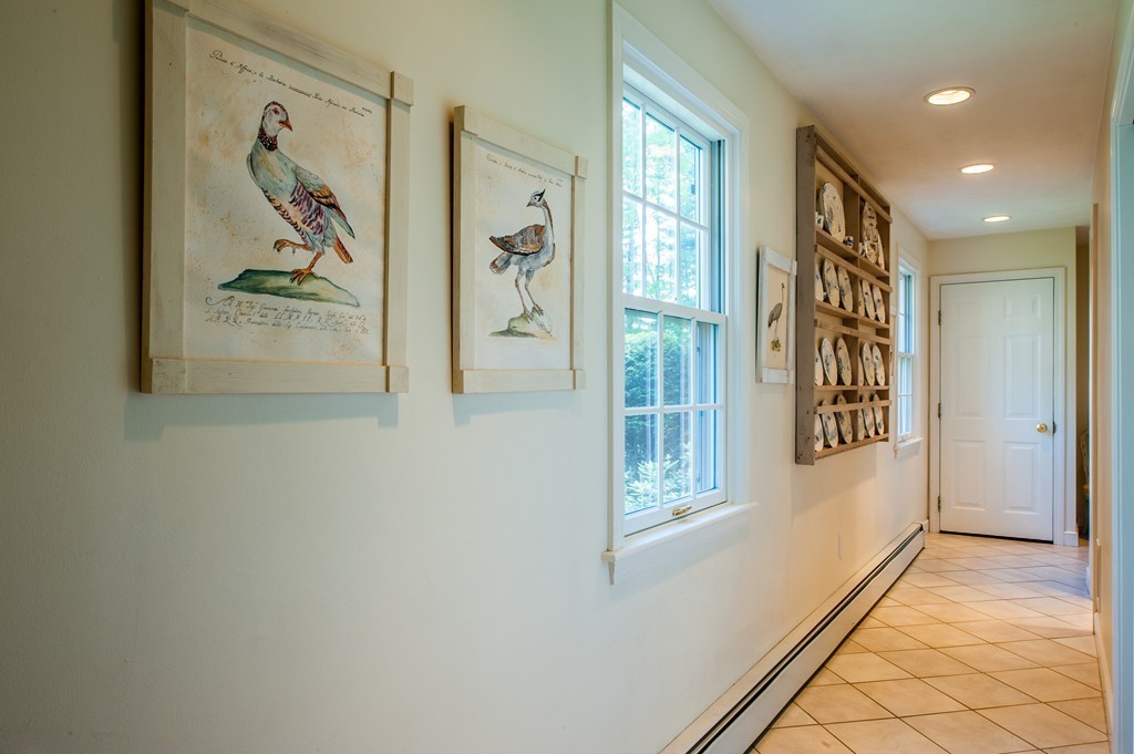 5 Holmes Road Boxford, MA 01921 - Photo 13 of 30 a view of a hallway with windows