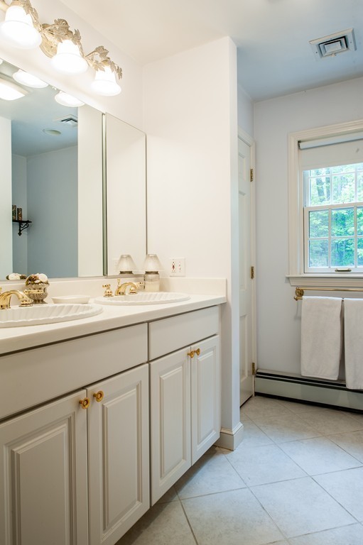 5 Holmes Road Boxford, MA 01921 - Photo 24 of 30 a bathroom with a sink and a mirror