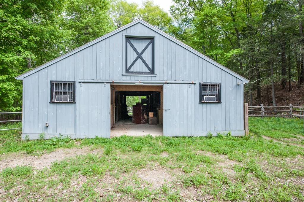 5 Holmes Road Boxford, MA 01921 - Photo 27 of 30 a view of a back yard of the house