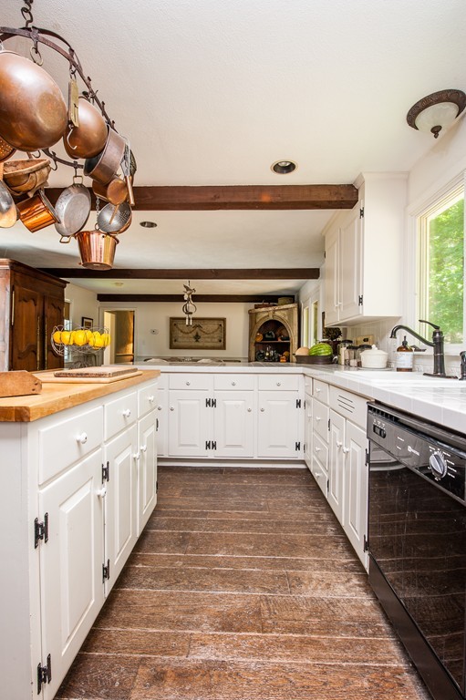 5 Holmes Road Boxford, MA 01921 - Photo 3 of 30 a kitchen with stainless steel appliances granite countertop a sink and cabinets with wooden floor