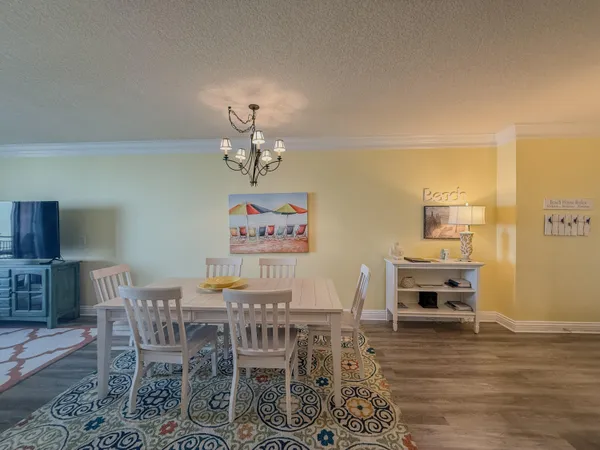 a view of a dining room with furniture